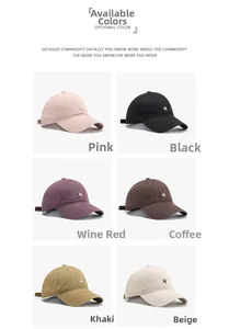 Close-up of baseball caps with H embroidery in pink, black, burgundy, and khaki colors