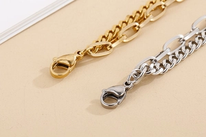 Detail of gold and silver double-layer stainless steel heart shell bracelets with lobster clasp