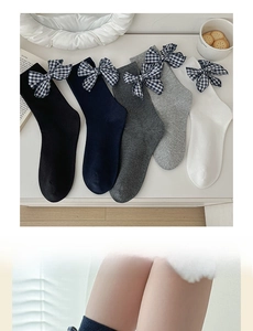 Detail of mid-calf cotton socks in five colors featuring cute gingham bow decorations