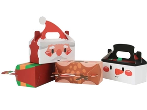 Detailed view of stacked Christmas candy boxes with Santa and reindeer cartoon prints