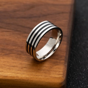 Minimalist 8mm stainless steel men's ring with three parallel black lacquer stripes