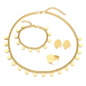 Golden titanium steel jewelry set featuring tassel Cuban chains and round disc charms