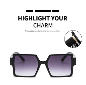 Detail view of square sunglasses with purple gradient lenses and premium metal hinges