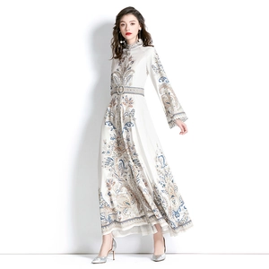 Elegant floral print maxi dress with flared sleeves and belted waist on white background