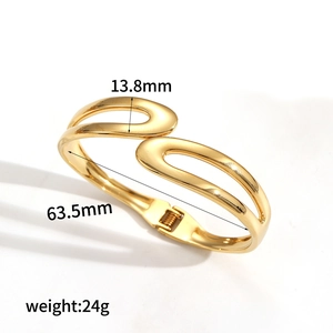 Detailed size view of gold stainless steel bangle with 13.8mm width and 63.5mm diameter