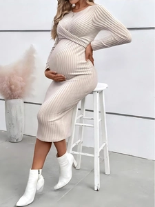 Detail of maternity dress with ribbed knit texture and stylish front twist waist design