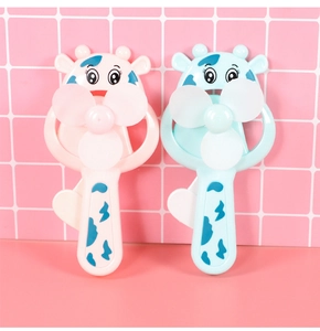 Cute pink and blue cow handheld fans showing manual press mechanical trigger mechanism