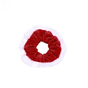 Red velvet hair scrunchie with white plush trim detail for elegant festive hairstyles