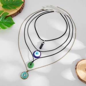 4-piece vintage ethnic necklace set with glass charms and bohemian geometric pendants