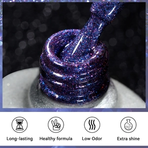 Macro shot of purple shimmering cat eye nail gel brush with extra shine texture