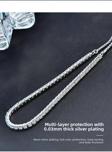 Macro shot of silver tennis bracelet with dense cubic zirconia and 0.03mm plating detail