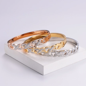 Elegant hollowed-out titanium steel bracelet with rhinestones in gold, silver and rose gold