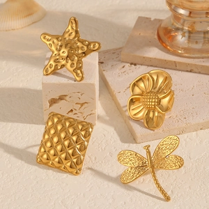 Gold stainless steel adjustable rings with starfish, flower, dragonfly and textured designs