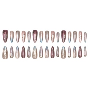 Golden 3D cat-eye almond press-on nails with embossed flower and butterfly designs