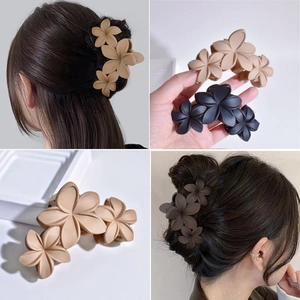 Matte floral hair claw clips for women featuring a triple flower design in beige and brown