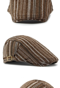 Détail du tissu rayé marron du béret avec boucle de réglage en bronze vintage