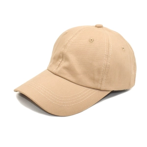 Detail view of cotton baseball cap crown with breathable eyelets and stitched brim