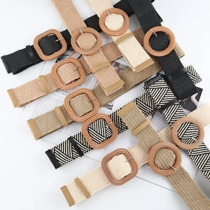 Detail of bohemian woven belts with round and square buckles in various neutral tones