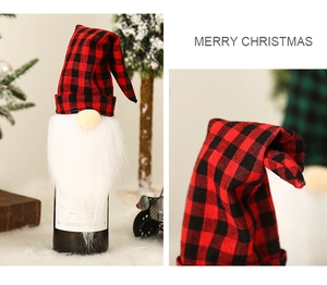 Close-up of red plaid Christmas gnome wine bottle cover with soft faux fur beard