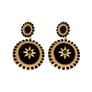 Vintage oval pearl earrings with gold star and green gemstone on black base