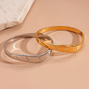 Bracelets chic en acier inoxydable irrégulier avec strass en finitions or et argent