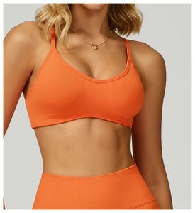 Details der nahtlosen orangen Ripp-Sport-BH und Leggings mit hoher Taille Gewebe