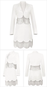 Detail view of white blazer dress featuring elegant silver fringe on waist and hemline