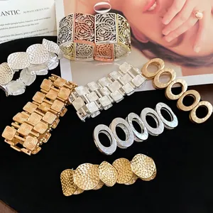 Metallic geometric stretch bracelets in gold and silver finish with textured patterns