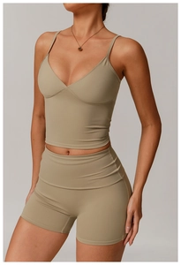 Detail of high-stretch eco-friendly yoga set with V-neck sports bra and high-waist shorts