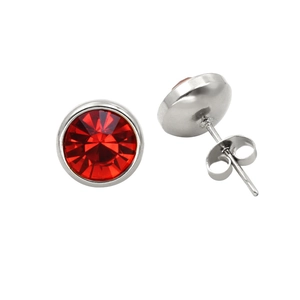 Macro shot of red round crystal stud earrings with polished silver metal butterfly backs