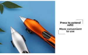Close-up of retractable ballpoint pen tip in orange and silver with sleek cone design