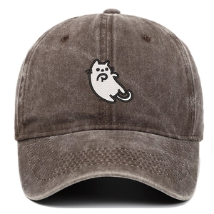 Close-up of vintage washed cotton baseball cap with white cat embroidery detail