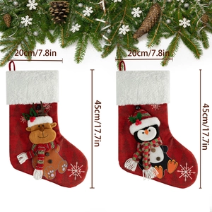 Detailed dimensions of 17.7in Christmas stockings featuring reindeer and penguin patterns