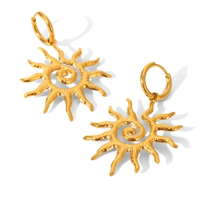 Golden sun-shaped stainless steel earrings with textured finish on white background