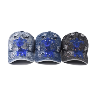 Distressed denim baseball caps with cartoon sheep graffiti in three washed vintage colors