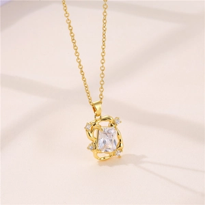 Elegant gold necklace with a rectangular zircon pendant and sparkling diamond accents
