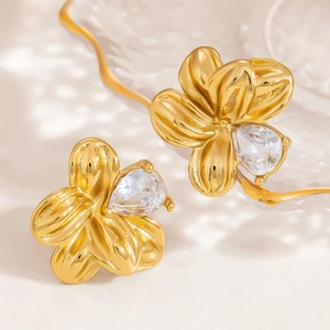 Exquisite 18K gold flower stud earrings with pear-shaped crystal centers for women