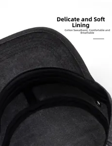 Detail view of cotton sweatband and breathable metal eyelets inside flat top army cap