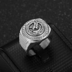 Macro detail of silver eagle signet ring with crystals and Philippine Eagles engraving
