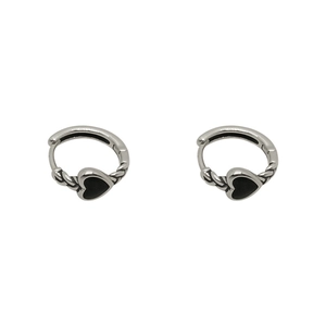 Minimalist silver hoop earrings with black heart charms and textured twist design