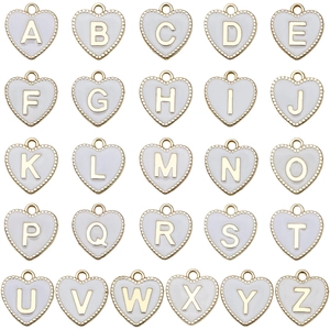 Collection of 26 heart-shaped white enamel A-Z letter charms with golden metal alloy frames
