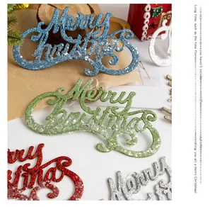 Close-up of glittery Merry Christmas hanging signs for DIY wreaths and trees