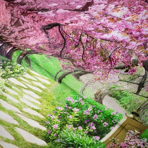 Close-up of high-quality polyester fabric with vibrant cherry blossom garden print