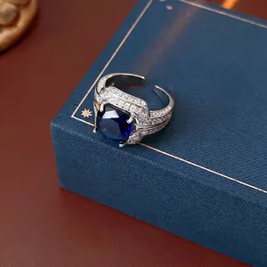 Luxurious adjustable open ring with square blue zircon and pavé crystals on silver band