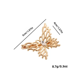 Gold hollow butterfly hair clip with clear gemstone and product size measurements
