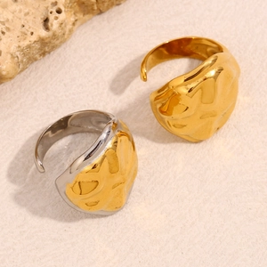 Close-up of 18K gold plated irregular lava texture rings with adjustable snake head design