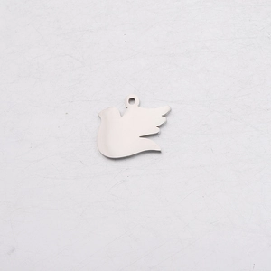 Close-up of a mirror-polished silver stainless steel flying dove pendant for DIY jewelry
