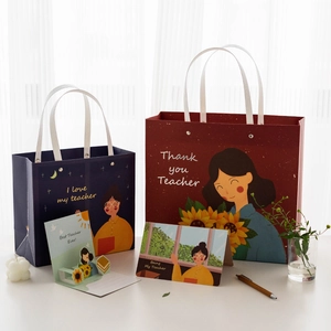Premium Teacher's Day gift bags in deep red and blue with gold foil thank you text