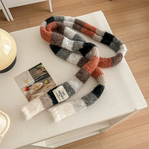 Rainbow striped knit scarf with colorful aesthetic on a clean white surface