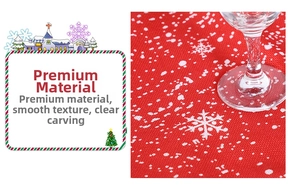 Detail of red Christmas table runner with white snowflake patterns and woven texture